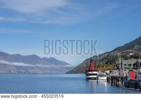 Queenstown New Zealand - April 14 2022; Lake Wakatipu View Down Lake To Converging Mountains Past St
