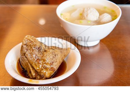 Rice Dumpling Is A Traditional Chinese Rice Dish Made Of Glutinous Rice And Wrapped In Bamboo Leaves