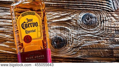Bottles Of  Tequila Jose Cuervo On A Wooden Table