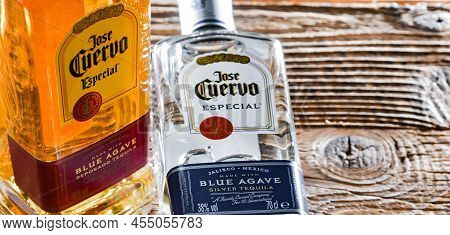Bottless Of  Tequila Jose Cuervo On A Wooden Table
