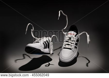 Belgrade, Serbia - May 12, 2022. New Adidas Tennis Shoes On White Background Sgot With Studio Lighti