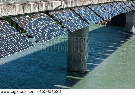 Outdoor Solar Cells For Generating Electricity On The Bridge Over River Rhein, Connecting Switzerlan
