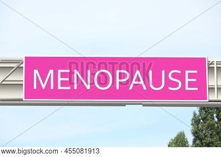 Concept Of Impending Climacteric. Pink Sign With Word Menopause Outdoors