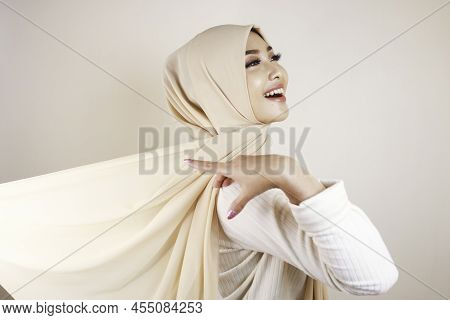 Muslim Woman Wearing Traditional Wear And Hijab Isolated On White Background. Hijab Is Creatively Ma