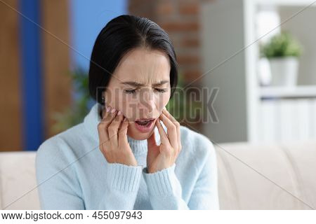 Woman With Severe Acute Toothache. Dental Problem And Caries Treatment Concept