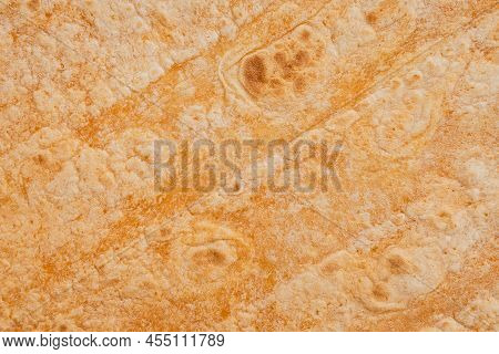 Tomato Flavored Wheat Tortilla Wraps. Spanish Or Mexican Circular Unleavened Flatbread From Wheat Fl