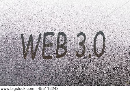 Web 3.0 Handwritten On Wet Glass Of Night Window