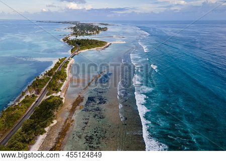 Aerial View Of Tropical Beach Landscape And Local Road At Addu City, The Southernmost Atoll Of Maldi