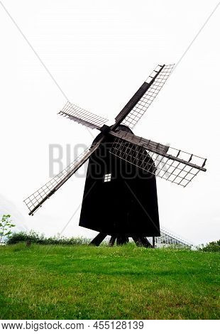 Old Winmill In Arhush Of Denmnark On A Cloudy Day