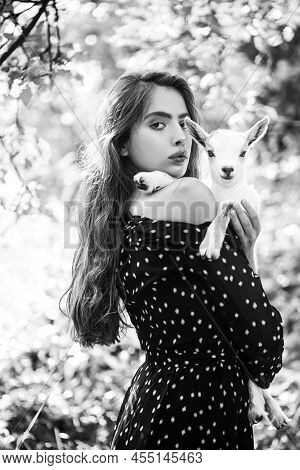 Natural Young Woman. Virgin Girl In Village Hold Yeanling. Sprinf Fashion Portrait Of Beautiful Woma