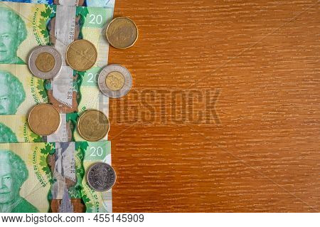 Calgary, Alberta - April 21, 2022: Finance Concept With Candian Curreny And Copy Space.