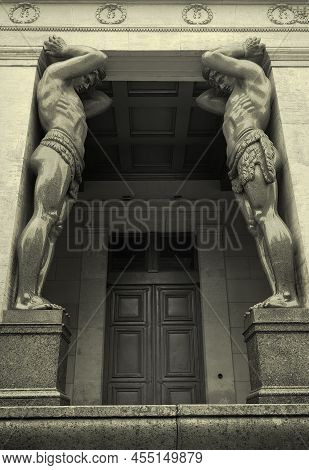 Saint Petersburg/russia-09.01.2020: Portico Of The New Hermitage. Stone Figures Of Atlanteans Holdin