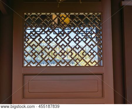 Latice Work On A Window In A Chinese Garden In South Seattle, Washington.