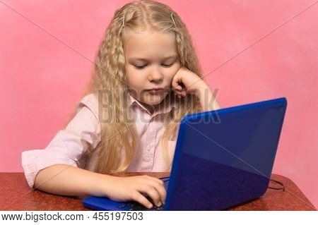 Sad, Brooding Schoolgirl Behind The Lepton. Pink Background.