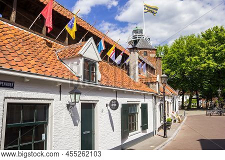 Harderwijk, Netherlands - May 22, 2022: White Houses In Front Of The Vispoort City Gate In Harderwij