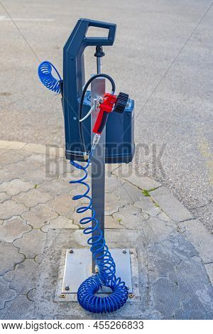 Air Pump Compressor Tyre Inflator Device At Gas Station