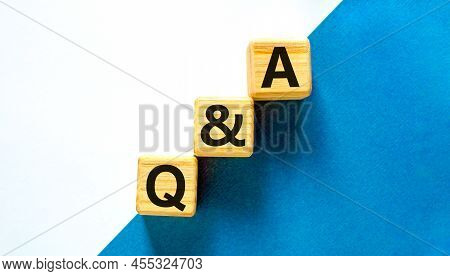 Q And A, Questions And Answers Symbol. Concept Words Q And A Questions And Answers On Wooden Cubes O