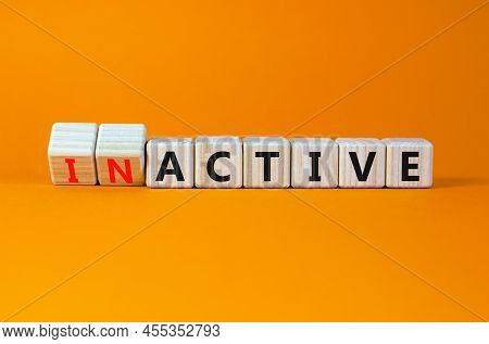 Active Or Inactive Symbol. Turned Wooden Cubes And Changed The Concept Word Inactive To Active. Beau