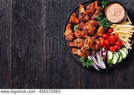 Spicy Roast Chicken Wings With French Fries, Tomatoes, Cucumber, Red Onion And Thousand Islands Dip 