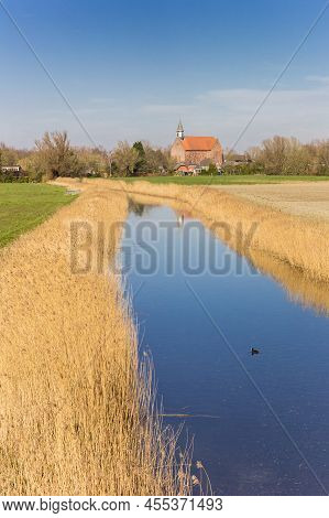 Small Town Holwierde In A Typical Dutch Landscape Near Appingedam, Netherlands