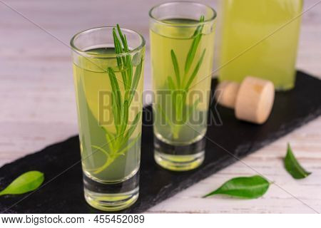 Limoncella With A Sprig Of Rosemary.italian Lemon Liqueur.