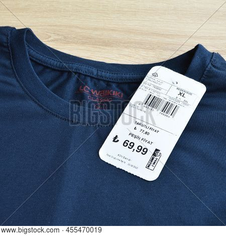 New Navy Blue Lc Waikiki Xl T-shirt And Blank Label, On Wooden Floor, May 01 2022 Istanbul Maltepe T