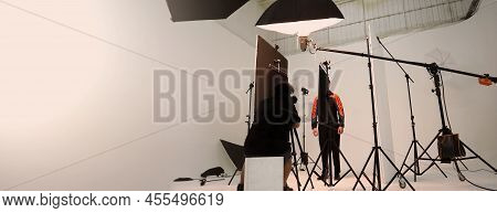 Studio Video Production Lighting Set. Behind The Scenes Shooting Production Set Up