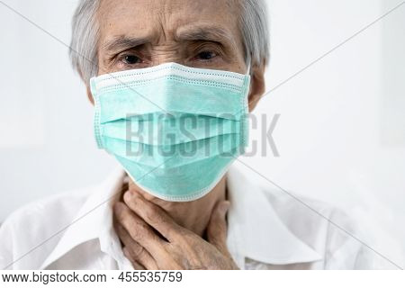 Sick Senior In Protective Mask,old People Has Sore Throat,cough,fever And Phlegm In The Throat,illne