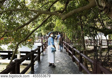 Travelers Thai Women Travel Visit And Walk On Stone Bridge Of Time Travel Journey Zone In Sea Ocean