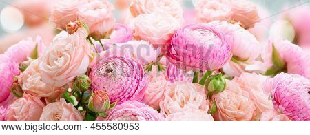 Rose And Rununculus Flowers Bouquet Over Gray Background With Copy Space