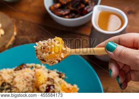 Big Dish Of Bulgur With Vegetables And Mushrooms On The Table. Horizontal Photo