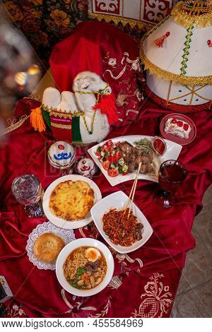 Kazakh Table-dastarkhan With Different Dishes. National Kazakh Festive Table
