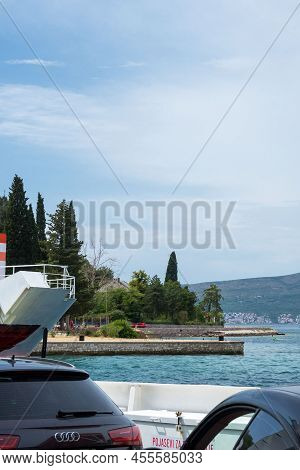 Igalo, Montenegro, July 2021. Ferry Crossing Kamenari-lepetani Montenegro In The Bay Of Kotor. View 