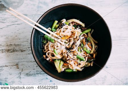 View Osf Asian Noodles Udon With Pork Close-up In A Bowl On The Table. Flat View.