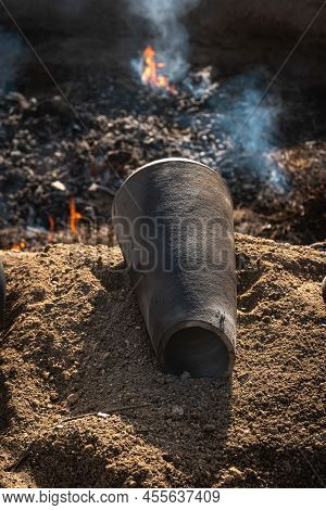 Amarante, Portugal - Circa April 2022: Final Stage Of Uncovering The Bonfire With The Pieces Of Clay