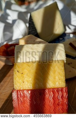 Spanish Hard Manchego, Cow, Sheep And Goat Cheeses Served Outdoor With Membrillo Jam In Sunlights
