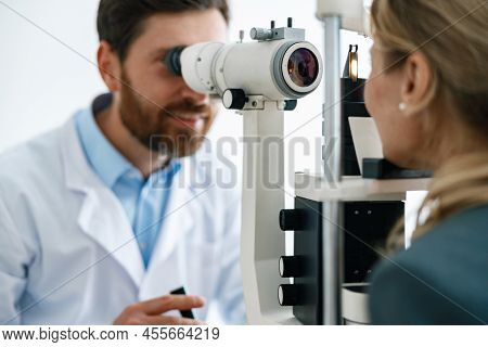 Close-up View Of A Optometrist Checks Patients Vision In An Optics Store Or Ophthalmology Clinic