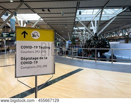 Vancouver, Canada - January 15,2022: View Of  Directional Sign Covid-19 Testing At Vancouver Interna
