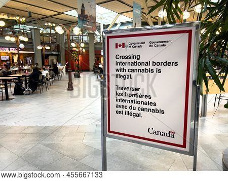 Vancouver, Canada - January 15,2022: View Of Sign Crossing International Borders With Cannabis Is Il