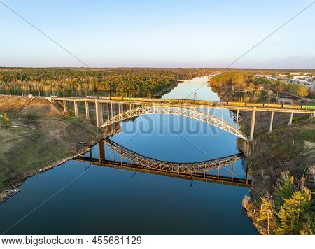 Beautiful View Of The Arched Railway Bridge Across The Iset River In The City Of Kamenkk-uralsky At