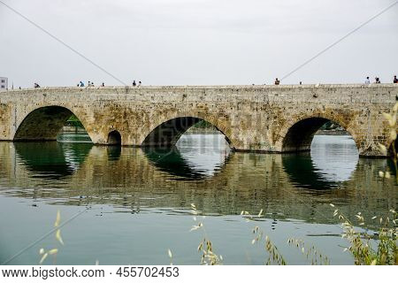 14 May 2022 Adana Turkey. Rock Bridge On Seyhan River At Adana Turkey On A Cloudy Day