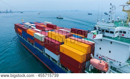 Aerial Side View Of Cargo Ship Carrying Container And Running For Export  Goods  From  Cargo Yard Po