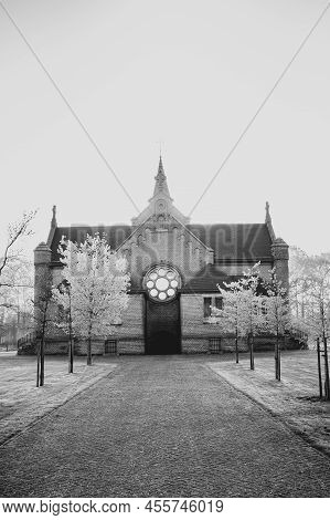 Merksplas, Belgium, April 27th, 2022, The Chapel In Merksplas Colony In The Bright Sunrise Light . H