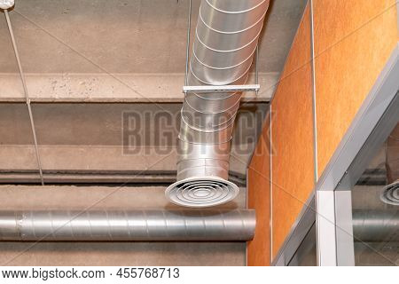 Bare Ceiling With Air Duct And Air Conditioner Pipe. Air Flow And Ventilation System. Interior Archi