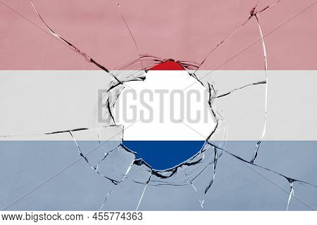 Flag Of Netherland On On Glass Breakage.