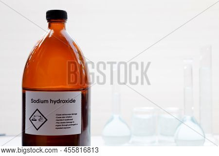 Sodium Hydroxide In Bottle, Chemical In The Laboratory And Industry