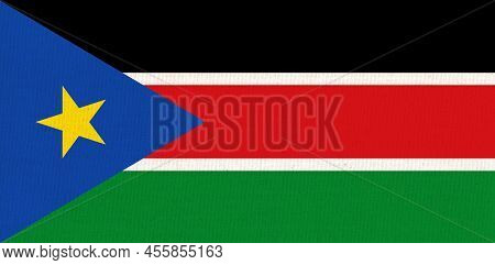 Flag Of South Sudan. South Sudanian Flag On Fabric Surface. Fabric Texture. National Symbol Of South