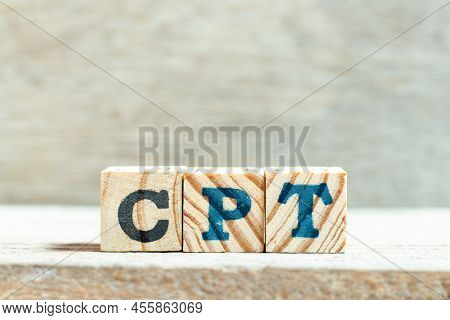 Alphabet Letter Block In Word Cpt (abbreviation Of Carriage Paid To) On Wood Background