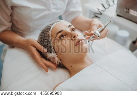 Woman Receiving Bio Oxidation Therapy At Spa Salon. Cosmetology Beauty Procedure. Rejuvenation Treat
