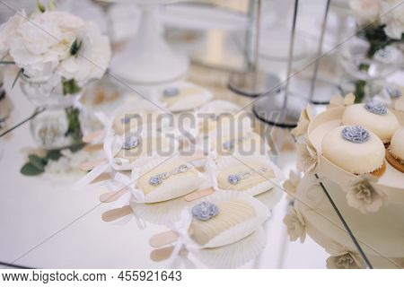 Cake Bar On Wedding. Differnt Type Of Sweeties On The Table. Eclair, Cake Pops, Muffins And Mamy Oth